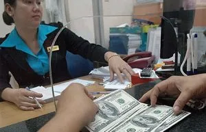 Ngan-hang-Nha-nuoc-dang-mua-vao-ngoai-te-2012-02-16-14-08-09